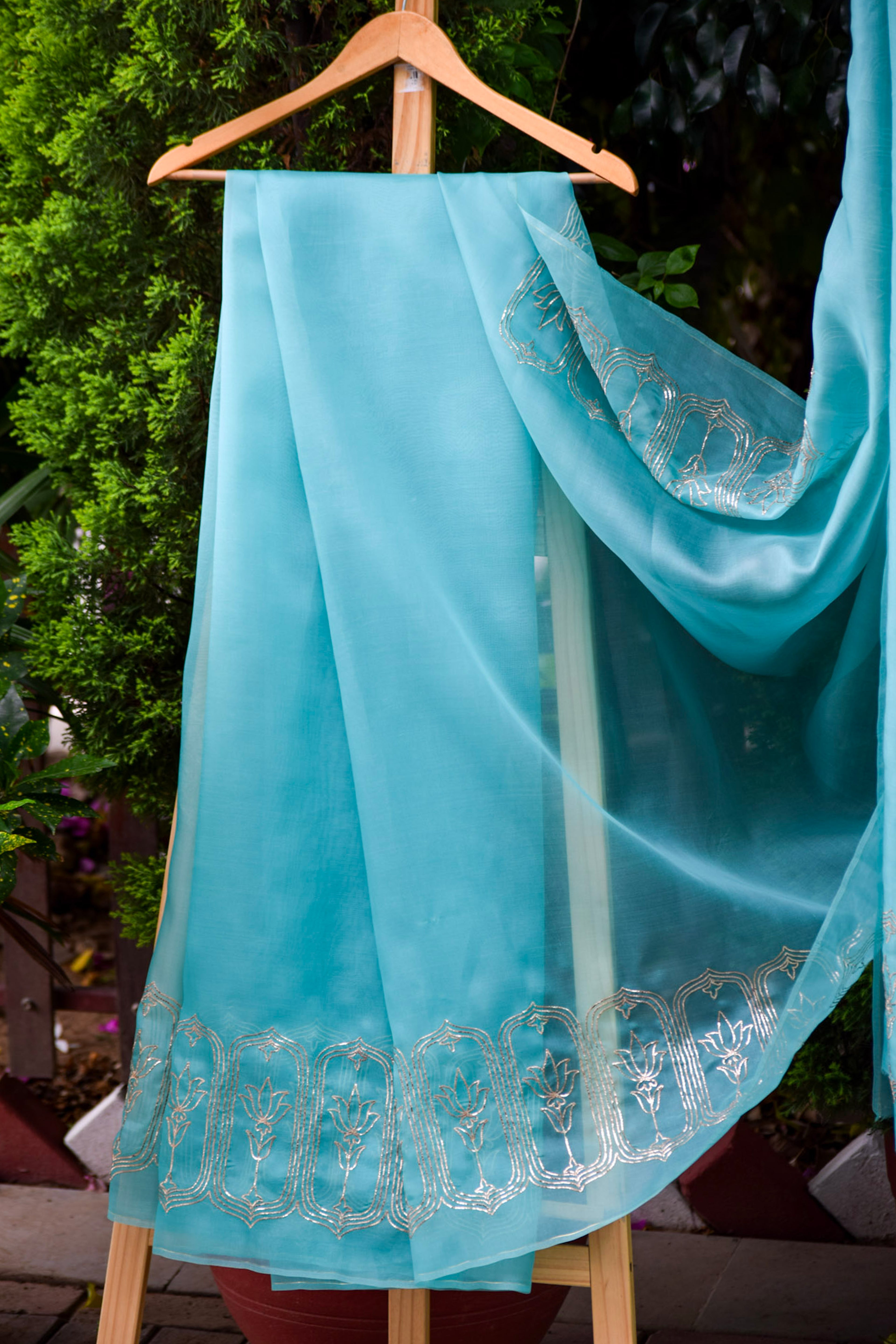Vasundhara Sky Teal Organza Saree