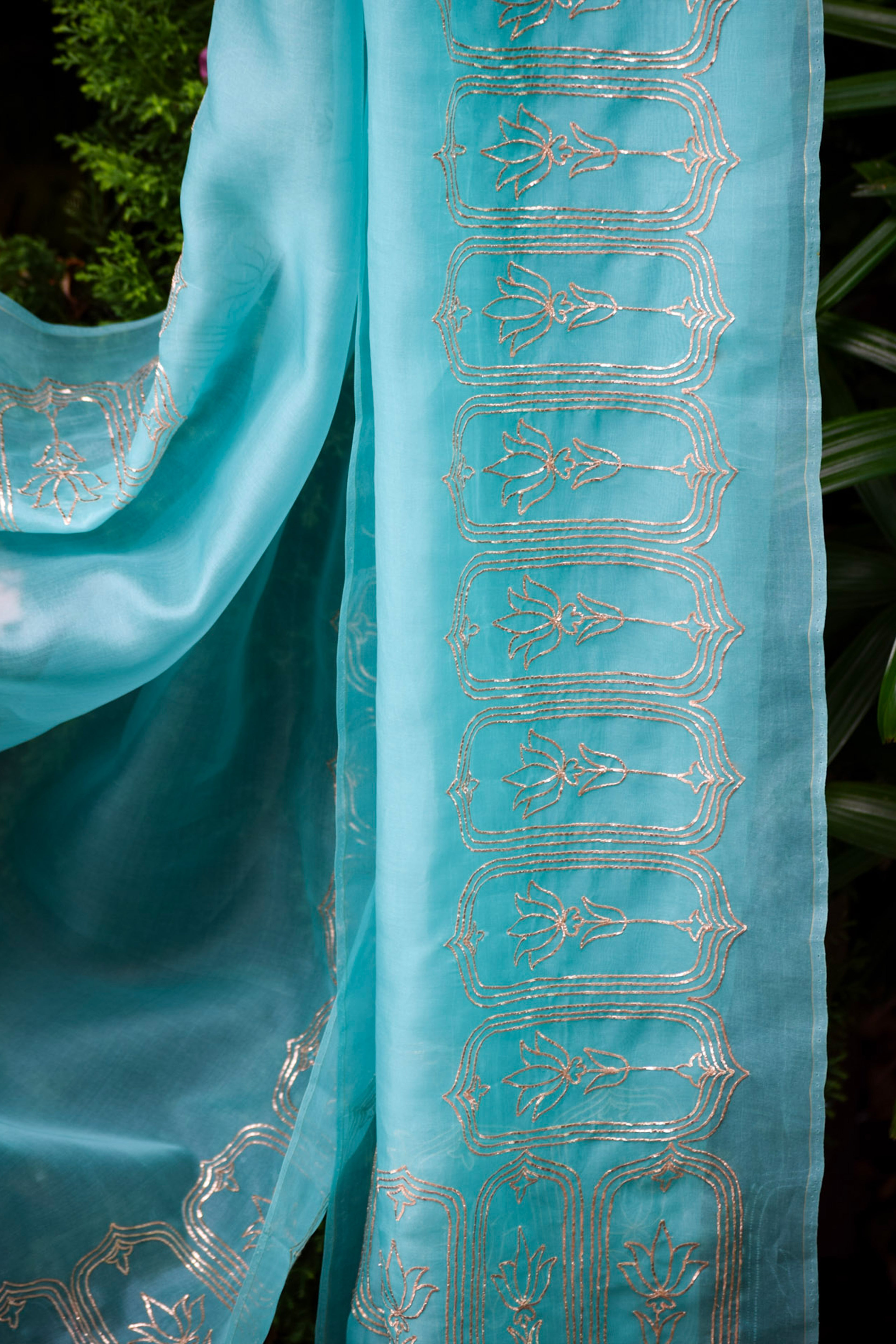 Vasundhara Sky Teal Organza Saree