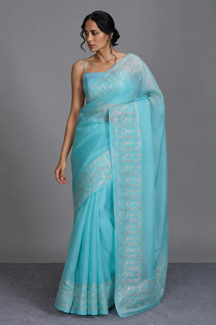 Vasundhara Sky Teal Organza Saree